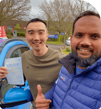 Instructor congratulating a learner driver
